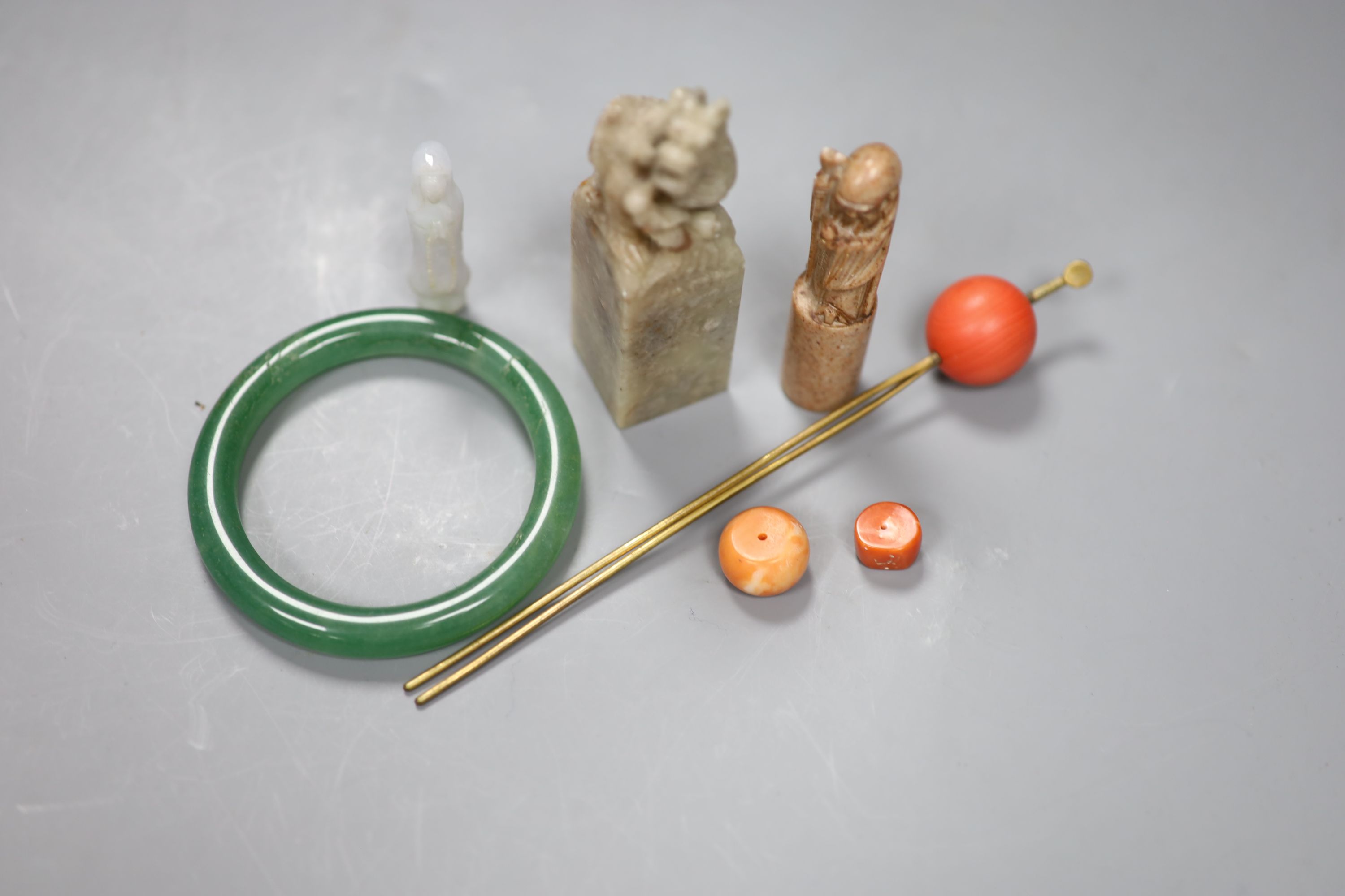 Chinese jades and corals: two seals, a bangle etc.